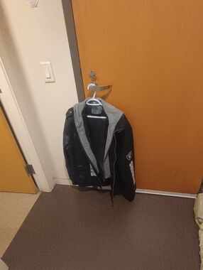 Men's Black Hooded Raiders Jacket with Gray Lining